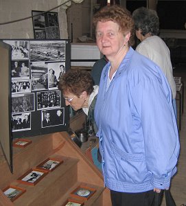 Here two visitors examine the enamels