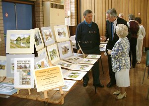 Raymond Whitehouse. He is seen here with our President, Trevor Genge, and our Secretary, Alma Darby.